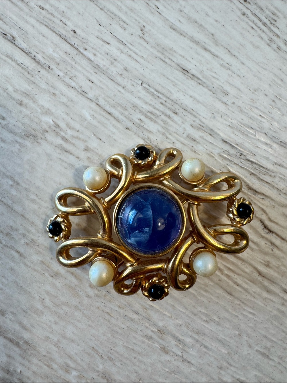 Vintage Monet Gold Tone Brooch with Blue Cabochon and Pearls